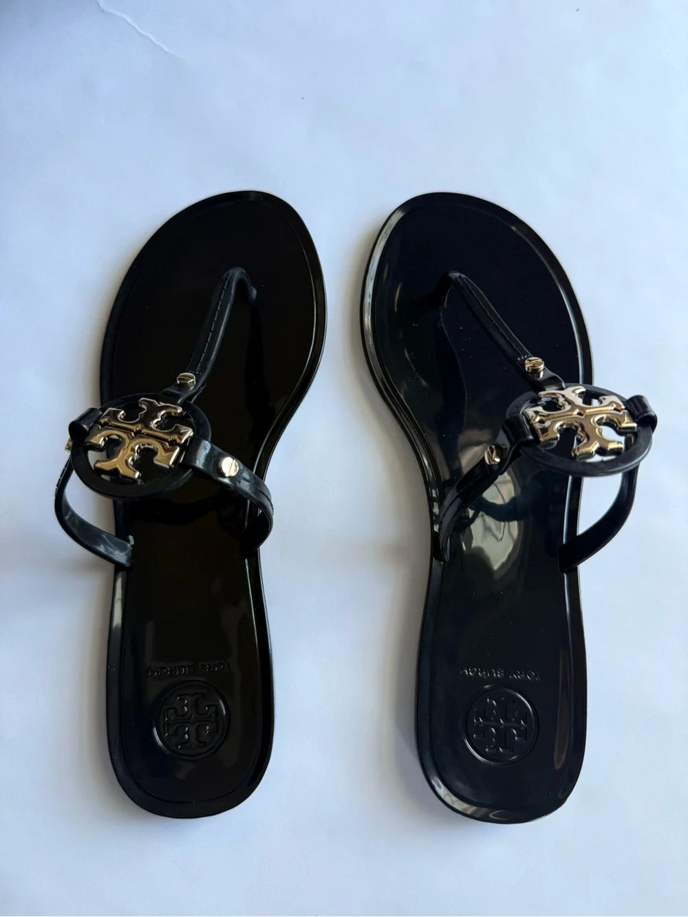 Tory Burch Black Jelly Thong Sandals with Gold Logo Emblem